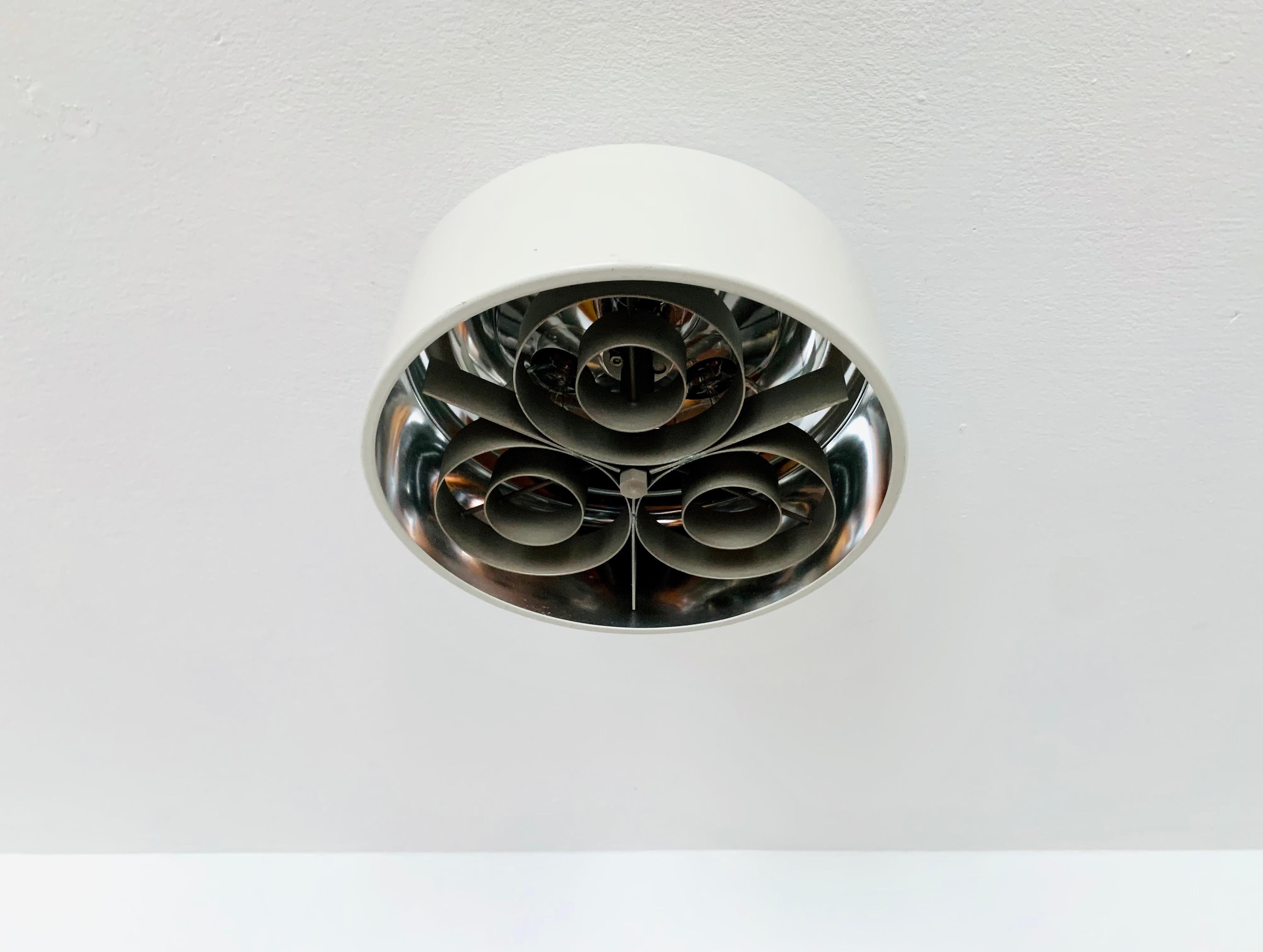 Danish ceiling lamp from the 1960s.
Exceptional design and very high quality workmanship.
The lamp is a highlight for every room.
The reflector creates a spectacular play of light

Condition:

Very good vintage condition with slight signs of