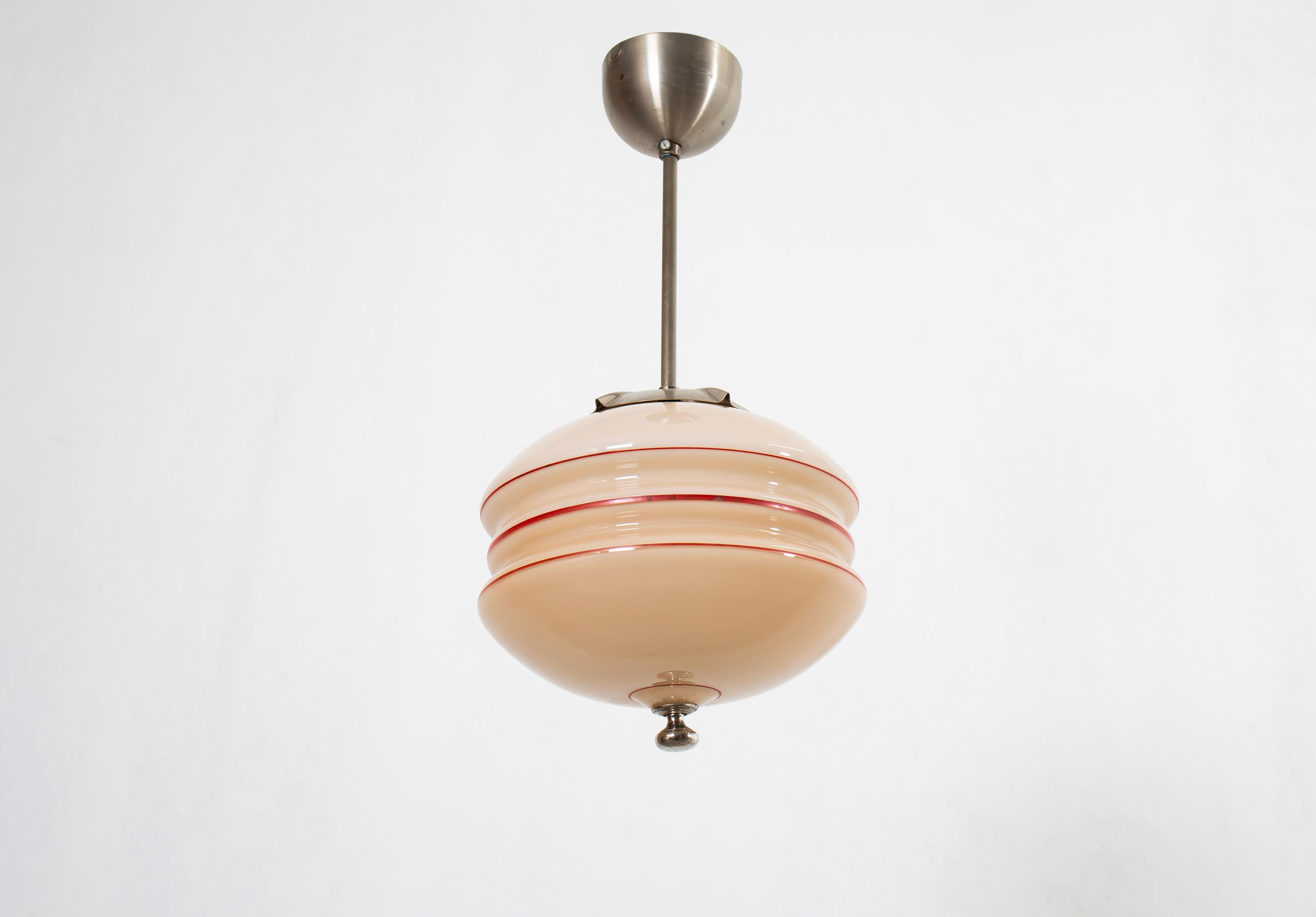 Wonderful ceiling light with decorated glass shade. Designed and made in Norway from ca 1950s first half. The lamp is fully working and in very good vintage condition. It is fitted with one E27 bulb holder (works in the US) and carries a max wattage