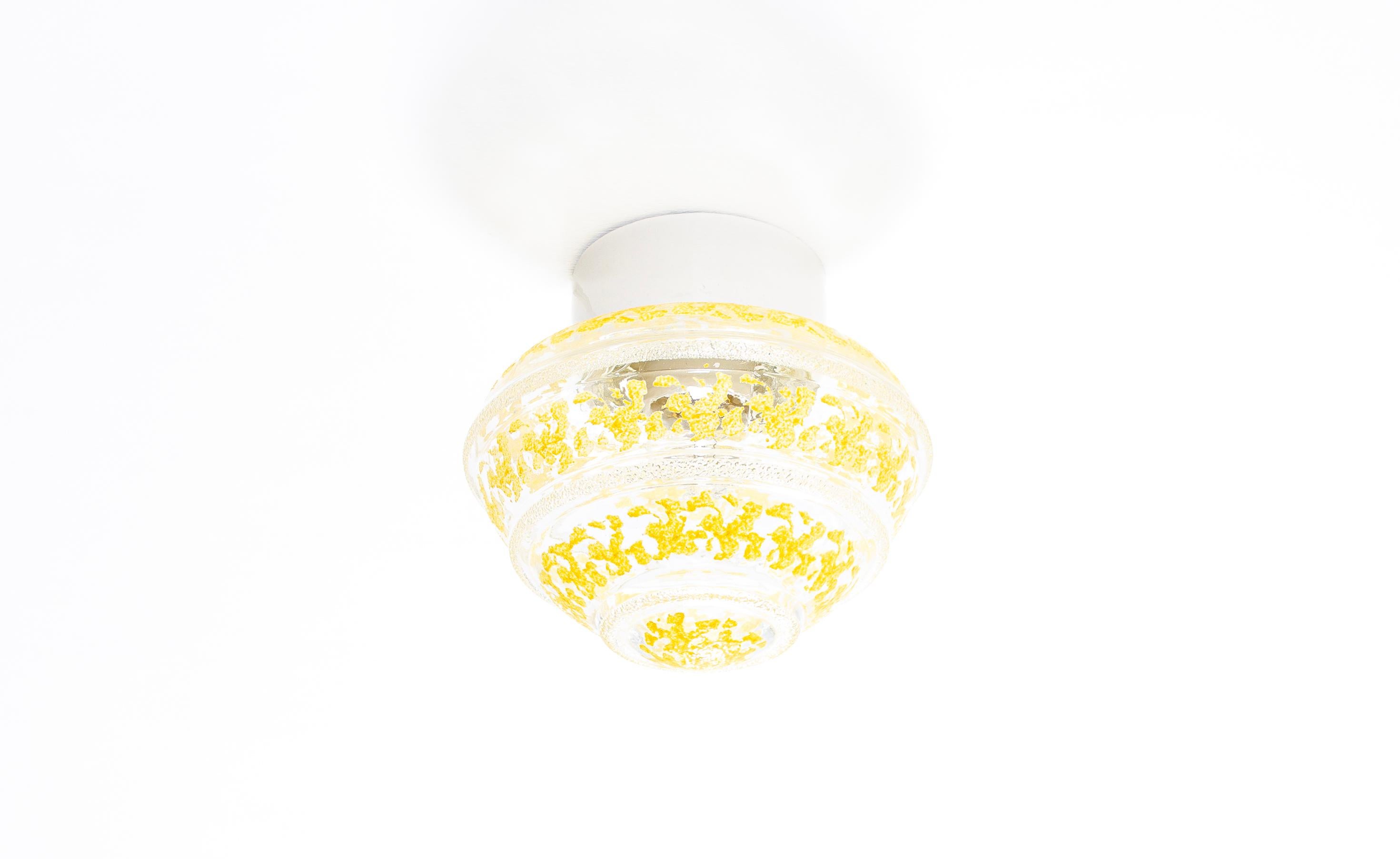 Wonderful and decorative ceiling light with shade in hand-painted glass and base in porcelain. Designed and made in Norway from circa 1950s first half. The lamp is fully working and in very good vintage condition. The lamp uses a E27 bulb (works in