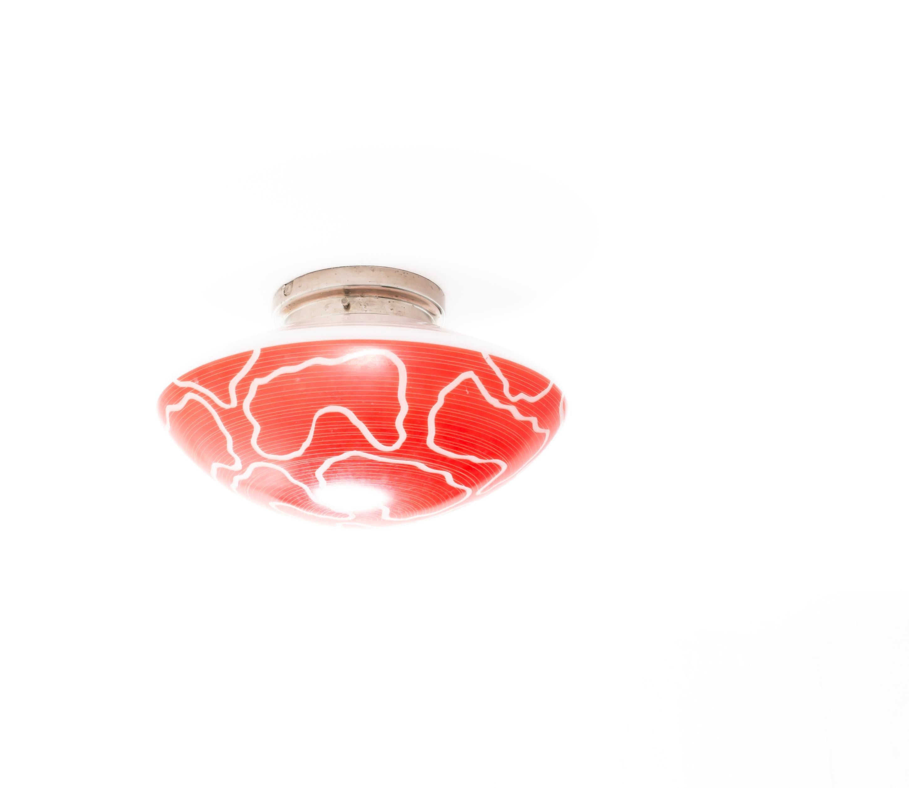 Wonderful ceiling light with organic hand decorated shade in opaline glass and chrome metal base. Designed and made in Norway from ca 1950s first half. The lamp is fully working and in good vintage condition. It is fitted with one E27 bulb holder