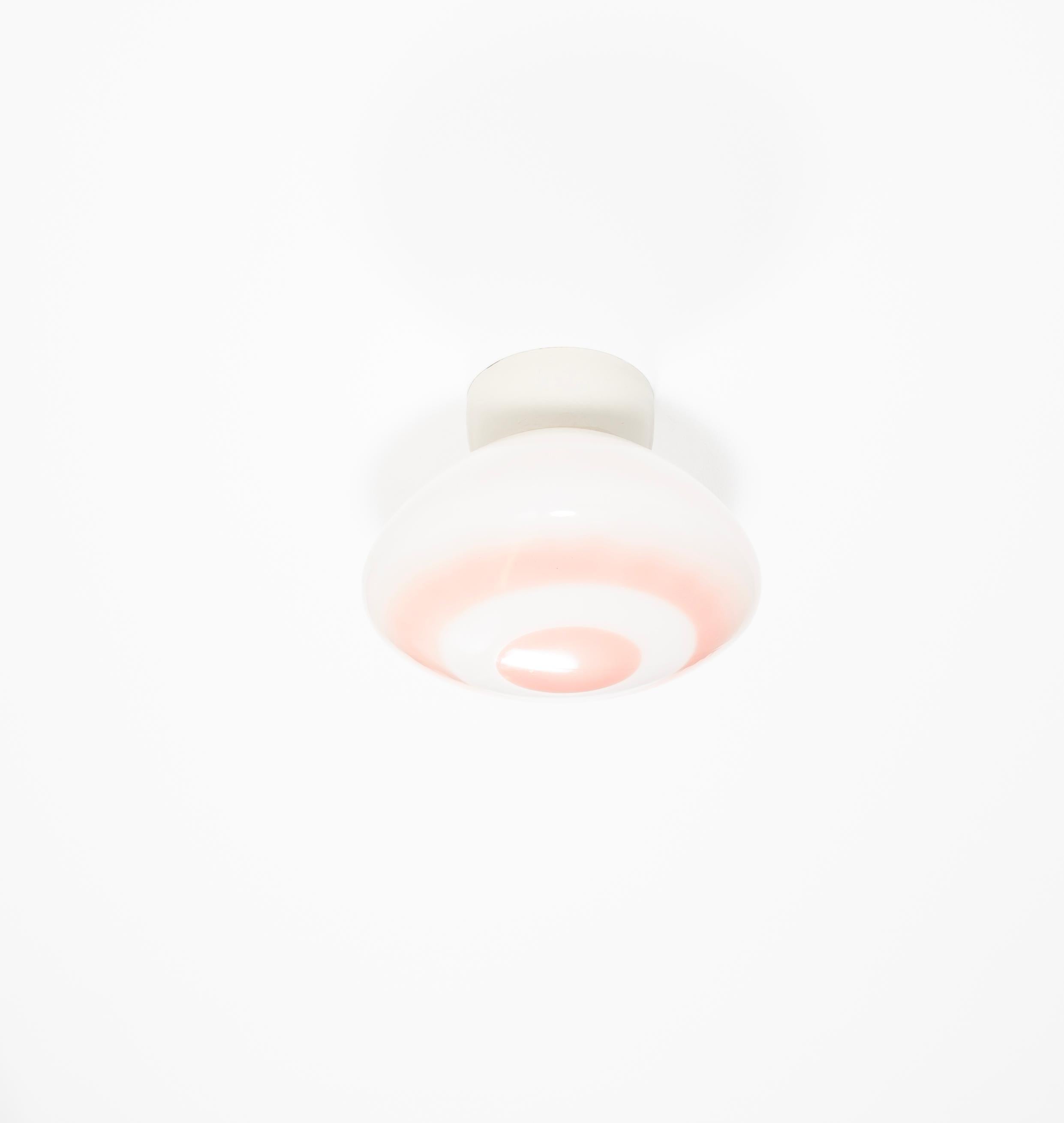 Wonderful ceiling light, with decorated glass shade and base in porcelain. Designed and made in Norway from circa 1950s first half. The lamp is fully working and in very good vintage condition. The lamp uses a E27 bulb (works in the US), with a max