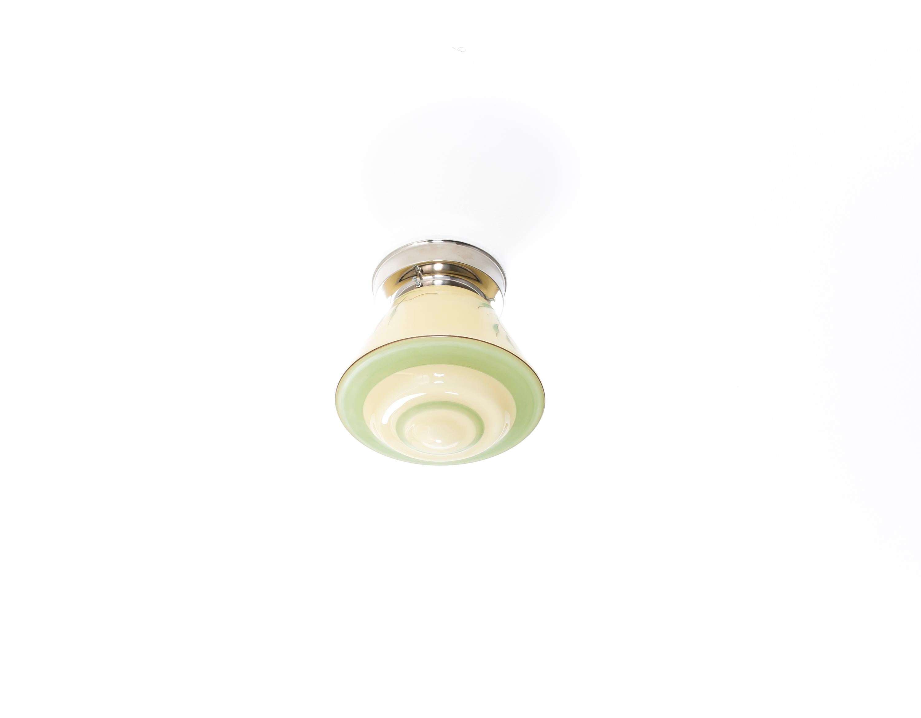 Wonderful and organic 1950s flush mount ceiling light. A beautiful and subtle example of Scandinavian mid-century design, where clean aesthetics and everyday practicality were combined.

Perfectly suited for entryways, hallways, or small-scale