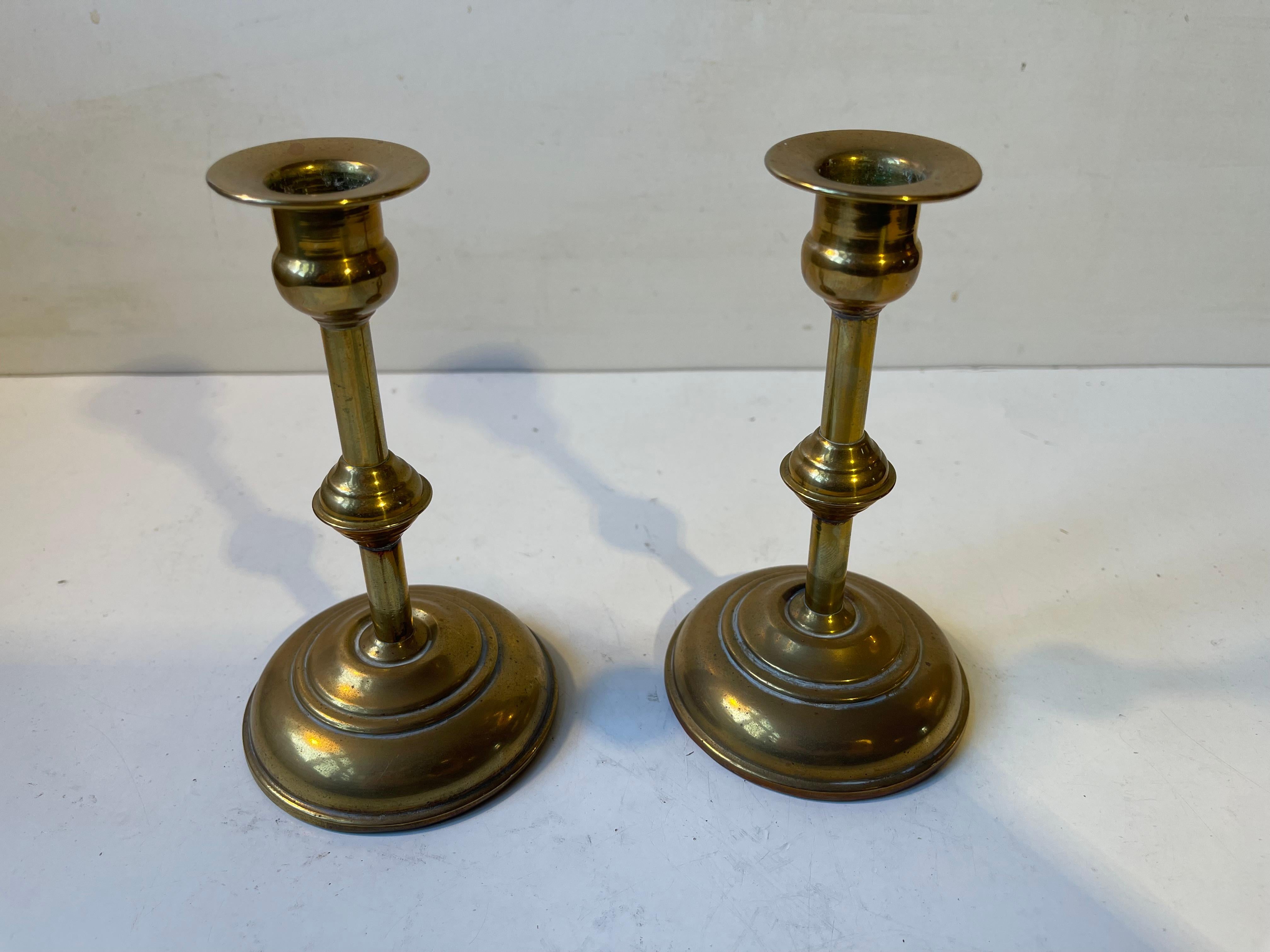 20th Century Scandinavian Functionalist Candlesticks in Brass For Sale