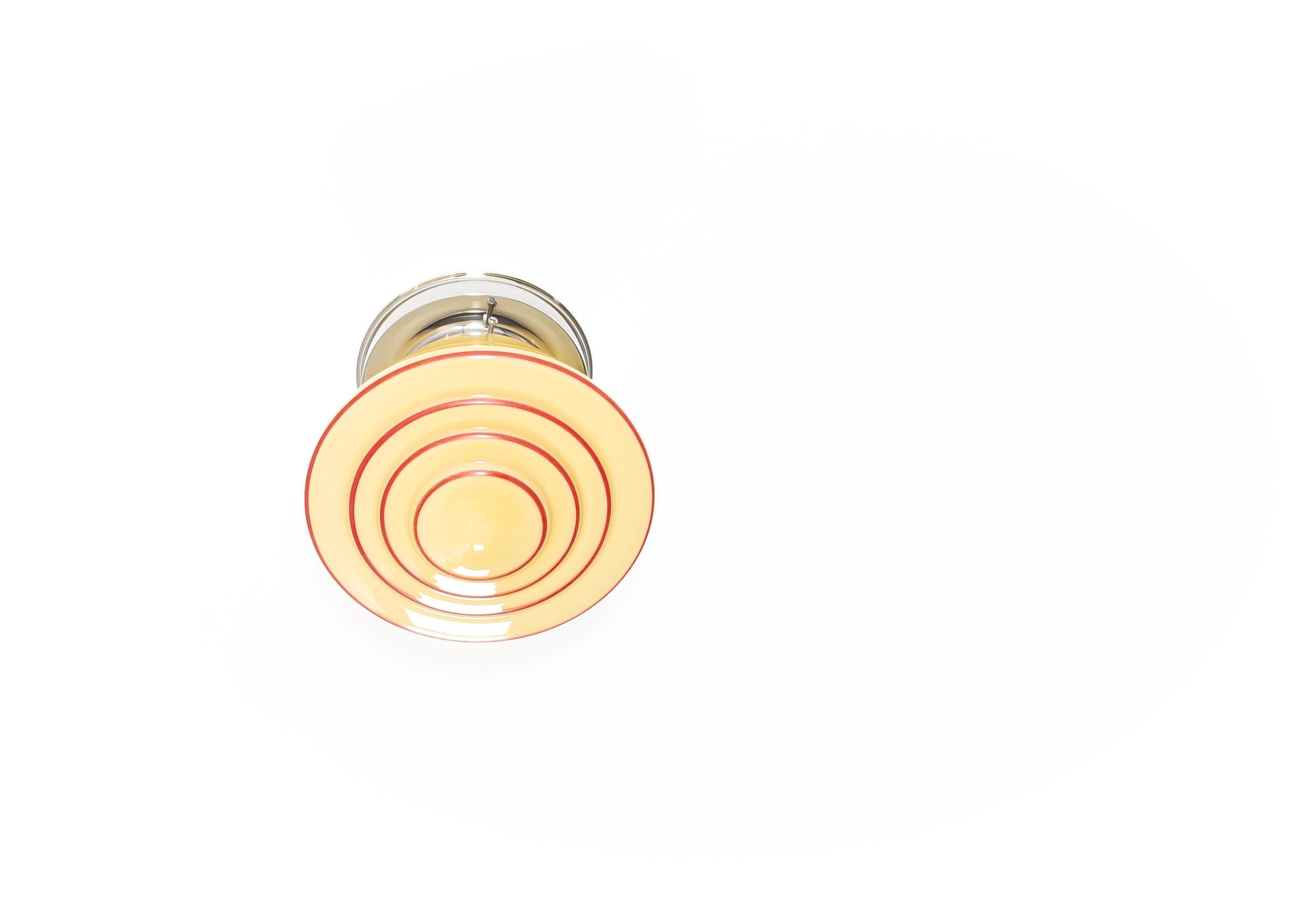 Wonderful and decorative ceiling light in opaline glass with chrome metal base. Designed and made in Norway from ca 1950s first half. The lamp is fully working and in good vintage condition. It is fitted with one E27 bulb holder (works in the US)