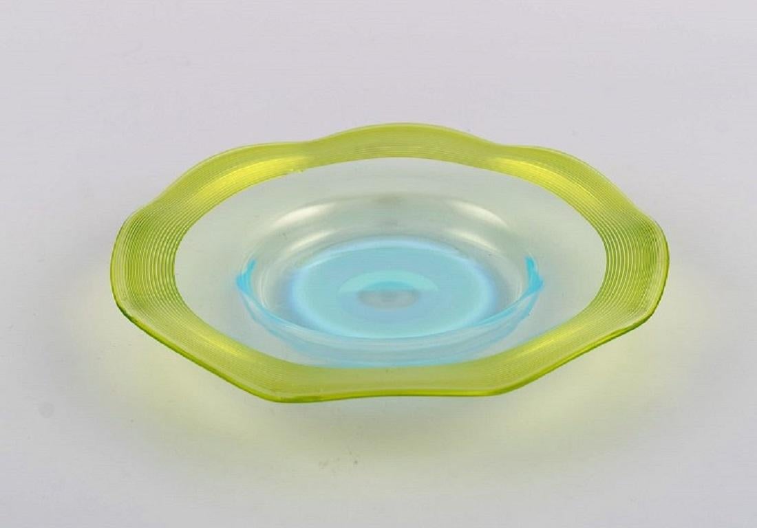 Late 20th Century Scandinavian glass artist. Plate and two bowls in mouth-blown art glass. For Sale