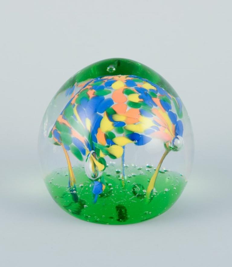 Scandinavian glass artist. Set of four paperweights in art glass. For Sale 1