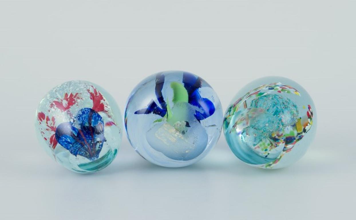Scandinavian glass artist. Set of three paperweights in art glass. Flower motifs For Sale 2