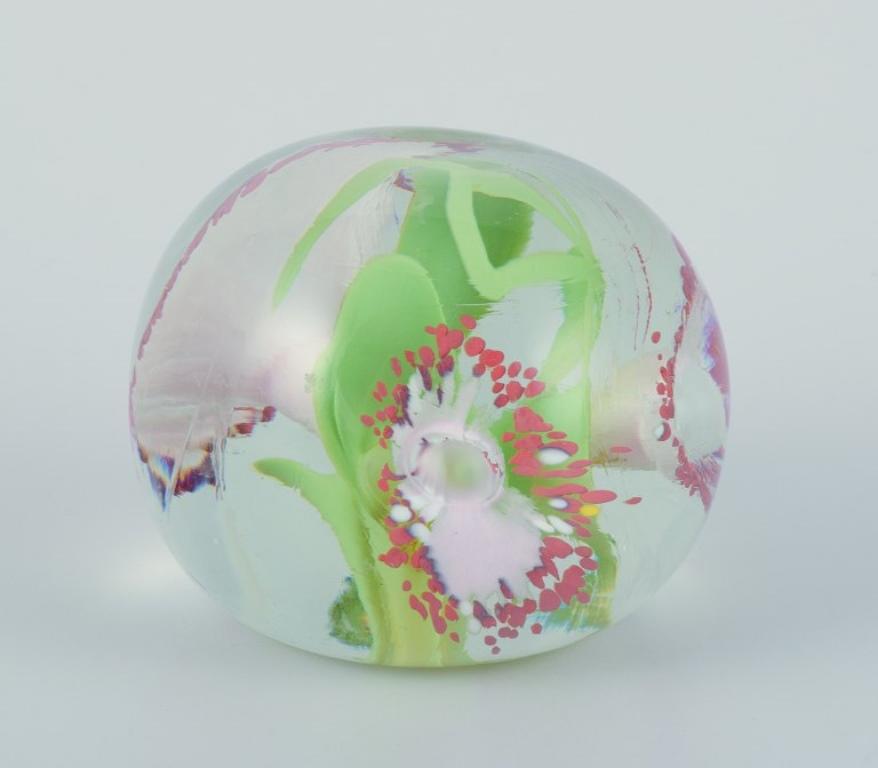 Italian Scandinavian glass artist. Three paperweights in art glass. Flower motifs. For Sale