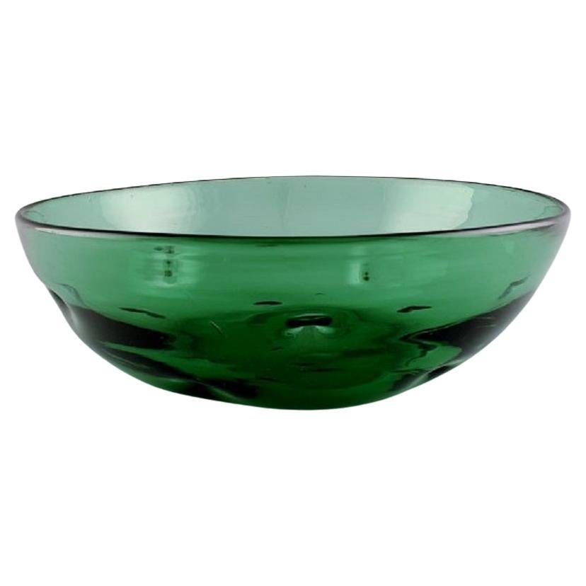Scandinavian glass artist. Unique bowl in green mouth-blown art glass. For Sale