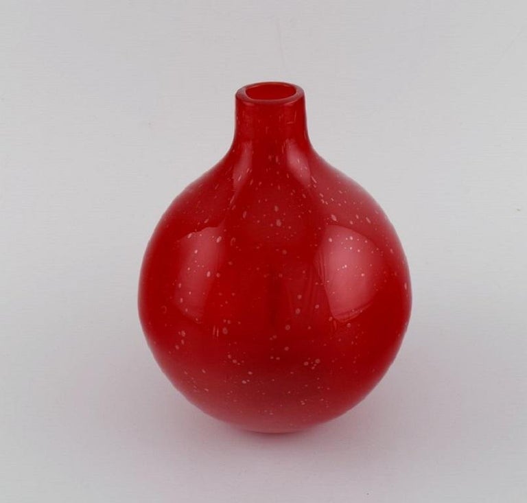 Scandinavian glass artist. Unique vase in red mouthblown art glass