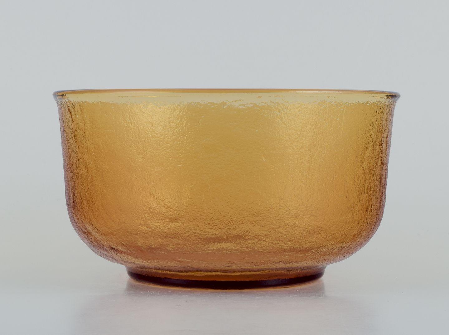 Pre-owned goods are exempt from import duties for U.S. customers. 
Therefore, no import tariffs will be applicable to your purchase.

Scandinavian glass designer. Salad bowl in smoke-coloured art glass. 
Handmade with visible bubbles in the
