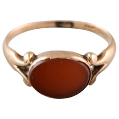 Scandinavian Goldsmith, 14 Carat Gold Ring Adorned with Red Agate