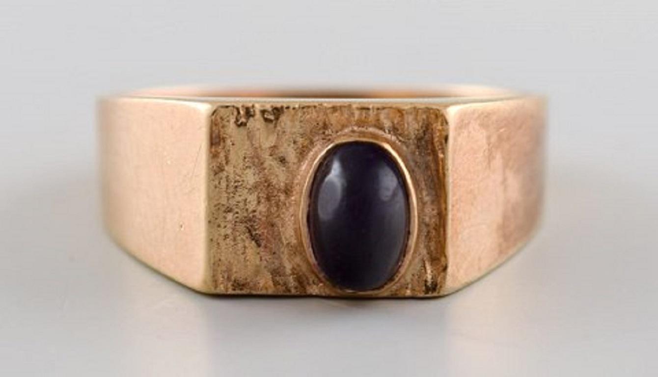 Oval Cut Scandinavian Goldsmith, 14 Carat Modernist Gold Ring Adorned with Dark Amethyst For Sale