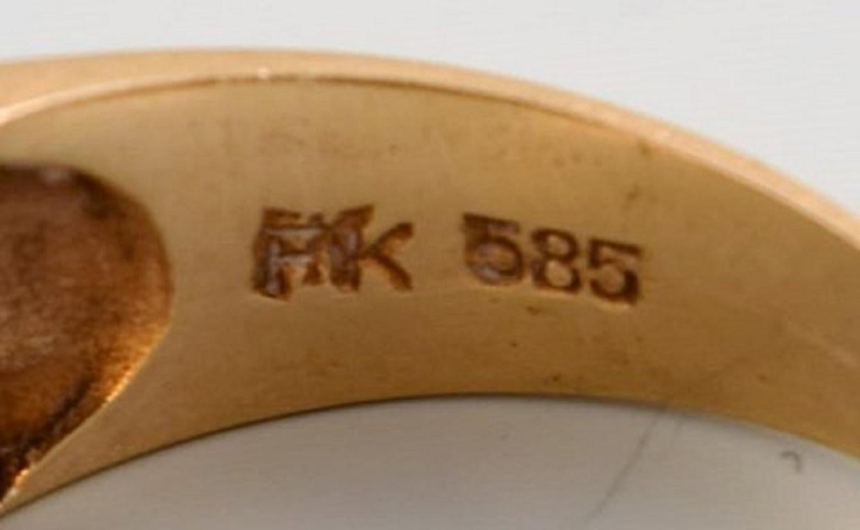 Scandinavian Goldsmith, 14 Carat Modernist Gold Ring Adorned with Dark Amethyst In Good Condition For Sale In bronshoj, DK