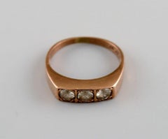 Scandinavian goldsmith. Vintage ring in 8 carat gold adorned with three stones