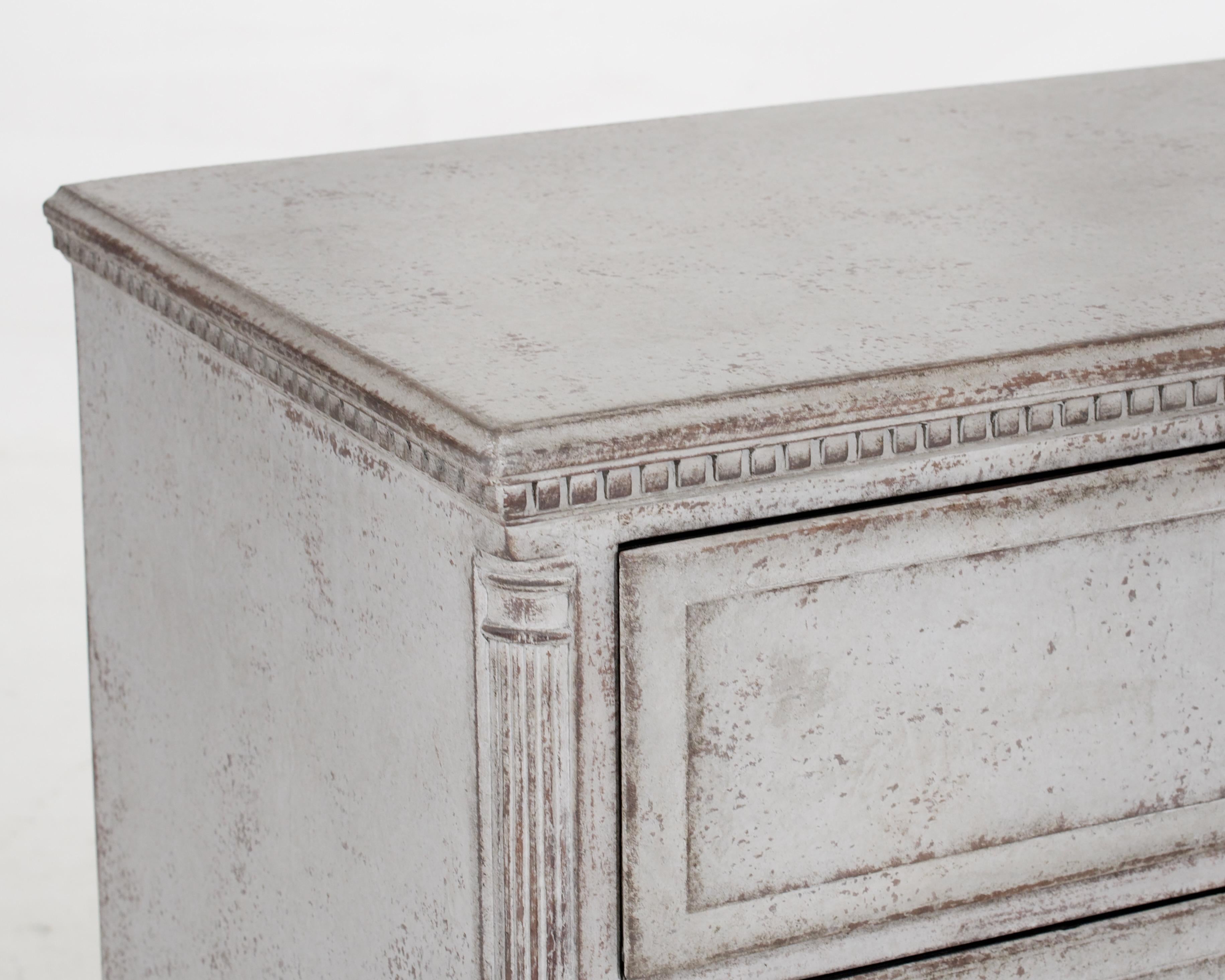 A 1790 Scandinavian Gustavian chest with three drawers, finely carved columns, and original locks exudes a timeless appeal.