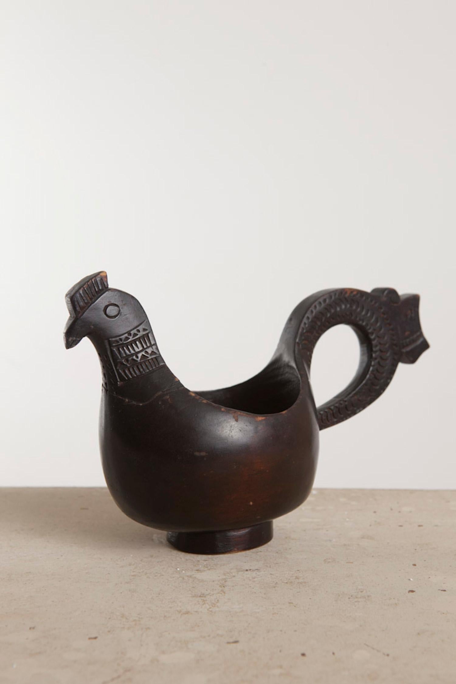 Allmoge hand-carved Ale Hen, origin: Scandinavia, circa 1800

An interesting custom in Scandinavia concerned the bride by her mother-in-law upon the return from the church. Before she dismounted from her horse she was given a small carved bowl