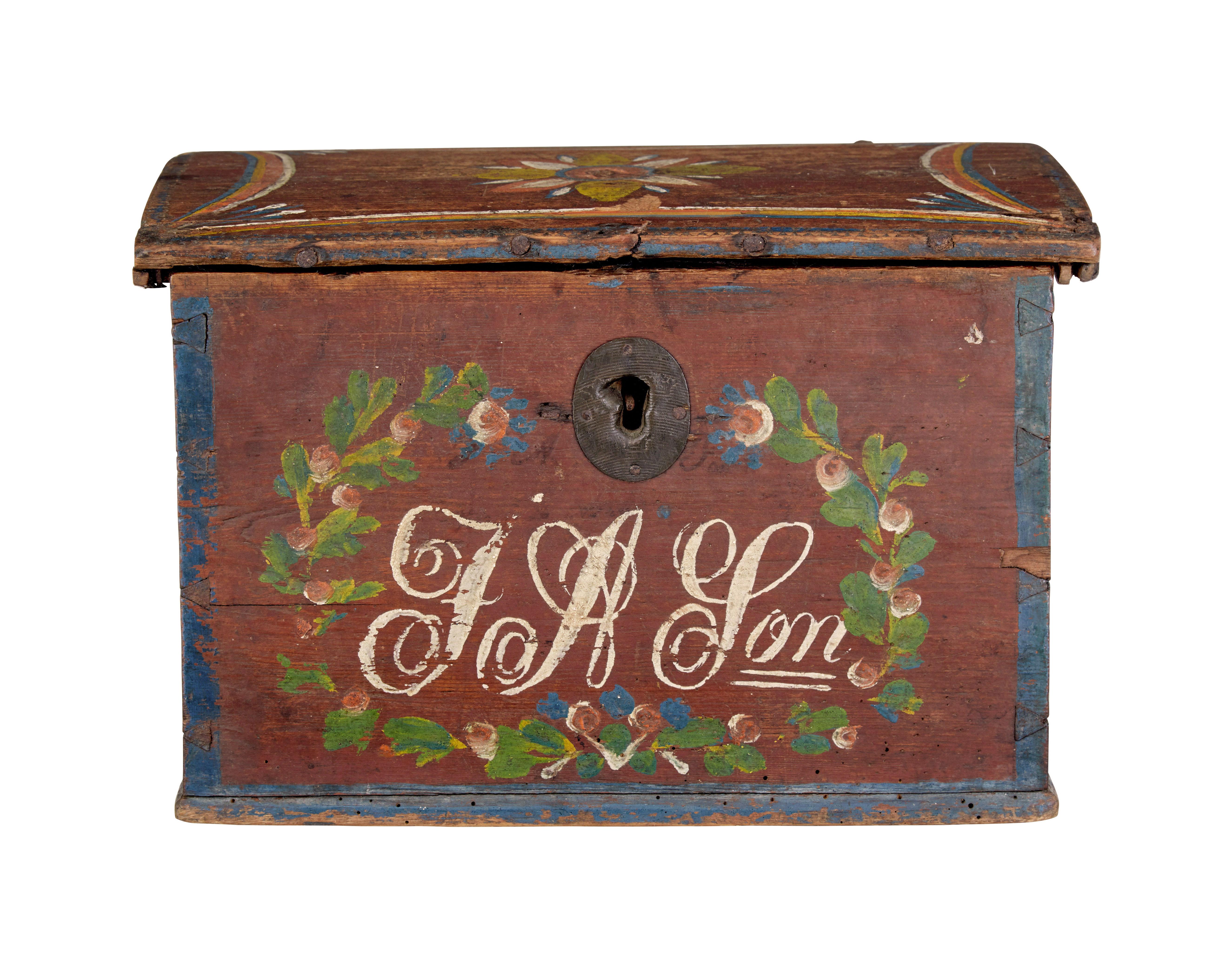 Scandinavian hand painted folk art pine box circa 1850.

Fine example of traditional Swedish hand painted woodenware.

Slight dome topped lid which opens to reveal a unfitted interior.  Plum coloured base colour, decorated in hand painted florals,