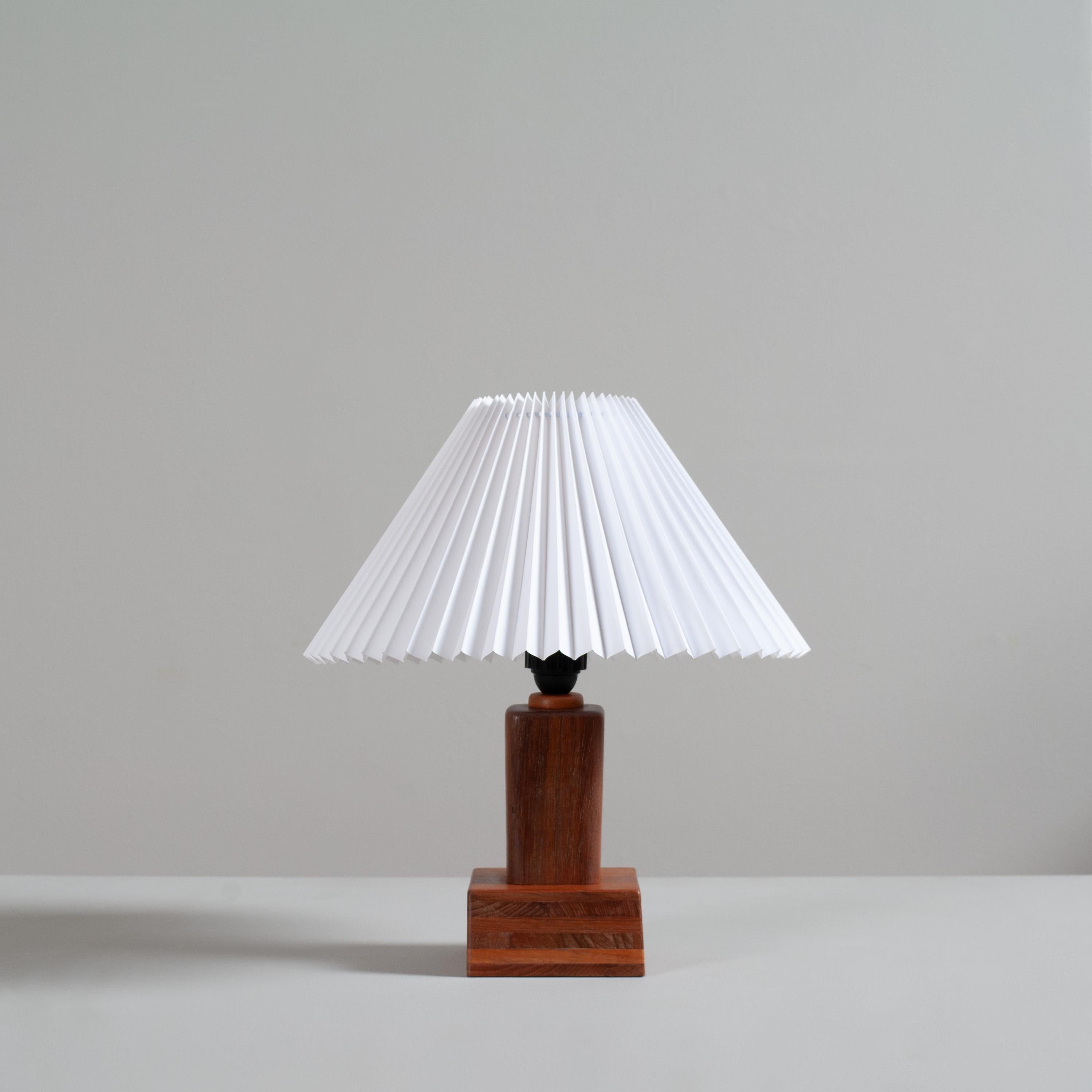 Charming handmade one of a kind table lamp. Made in Scandinavia circa 1950/60. 
Bold and chunky solid teak. Height is to the top of the lamp - not to top of shade.
Shade for illustration purposes only - can be supplied in addition. Please enquire.
