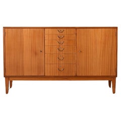 Scandinavian highboard with center drawers