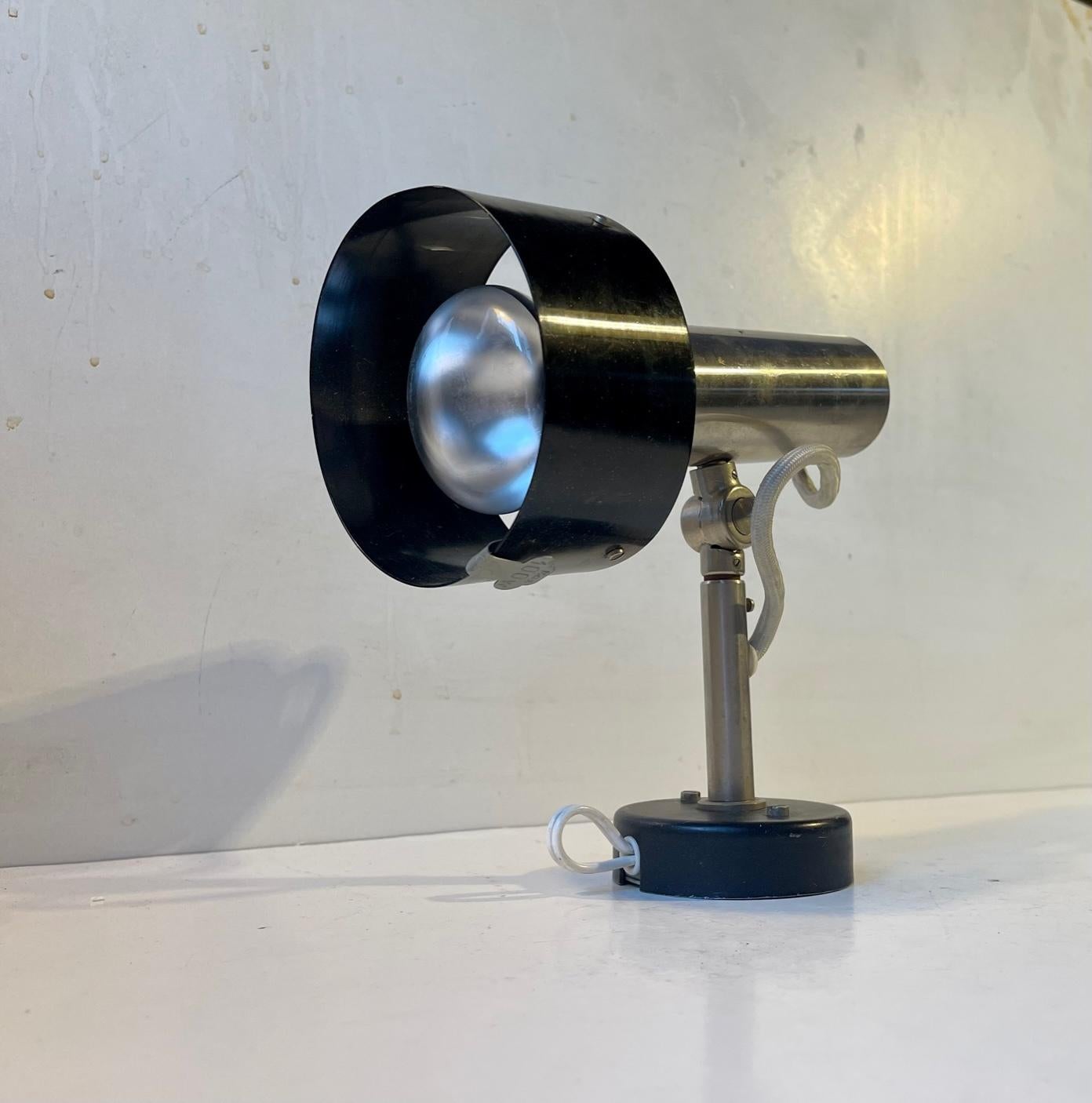 Some Danish auction houses attributes the design of this adjustable wall sconce to Preben Fabrisius and Jorgen Kastholm. Being manufactured by Nordisk Solar in Denmark this attribution it is rather plausible. However we have not been able to confirm
