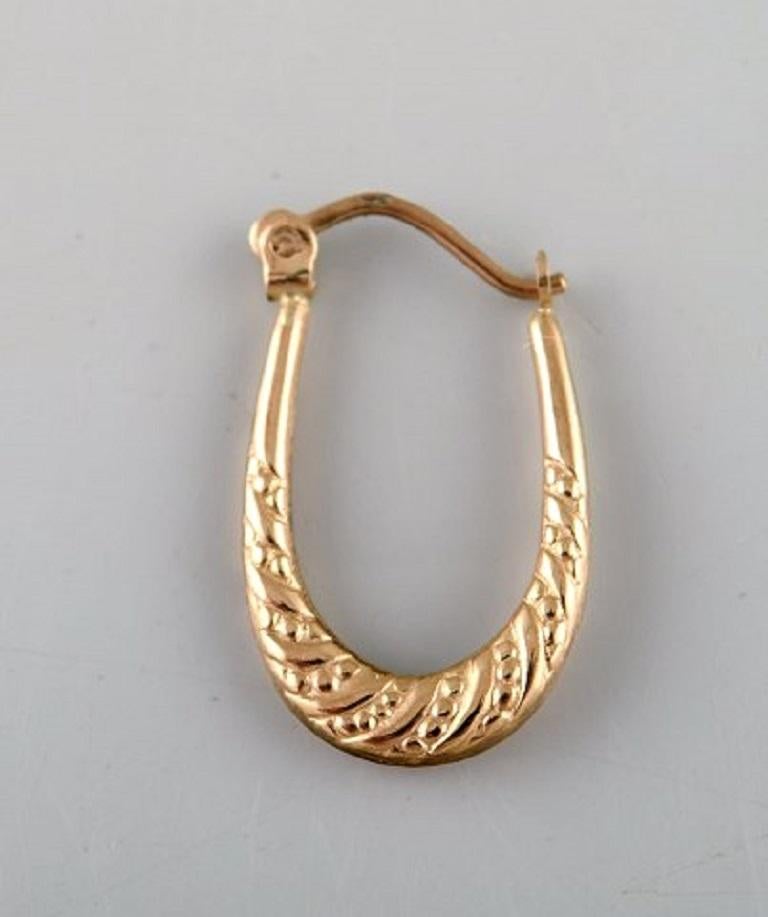 Scandinavian jeweler. A pair of 8 carat gold earrings in the form of horseshoes. Mid 20th century.
Measures: 20 x 14 mm.
In very good condition.
Stamped.