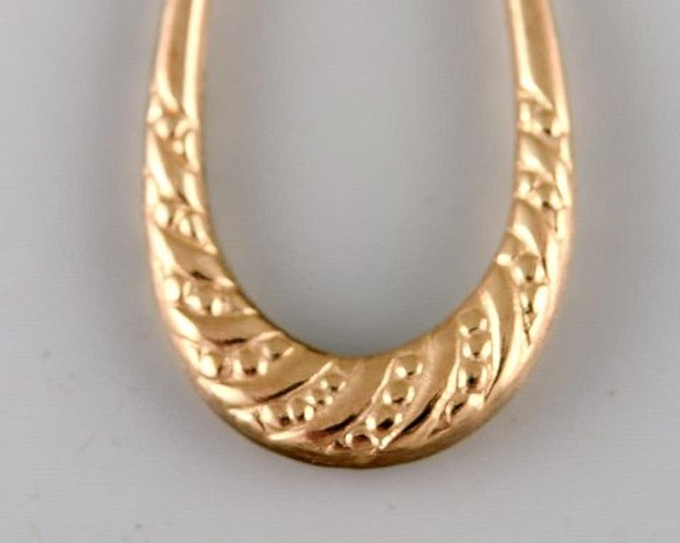 Modern Scandinavian Jeweler, a Pair of 8 Carat Gold Earrings in the Form of Horseshoes