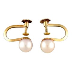 Scandinavian Jeweler, a Pair of Classic Earrings in 14 Carat Gold