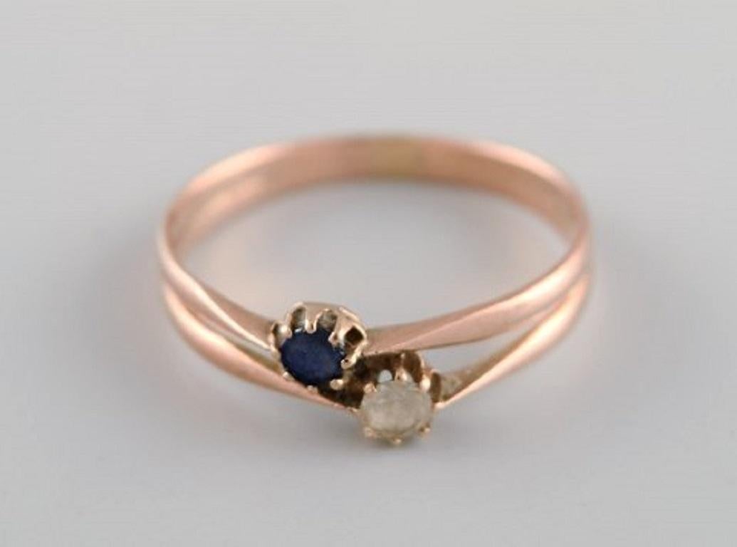 Scandinavian jeweler. Ring in 14 carat gold adorned with blue and clear semi-precious stones. 1930s.
Diameter: 17.3 mm.
US size: 7.
In excellent condition.
Stamped.
In most cases, we can change the size for a fee (USD 50) per ring.