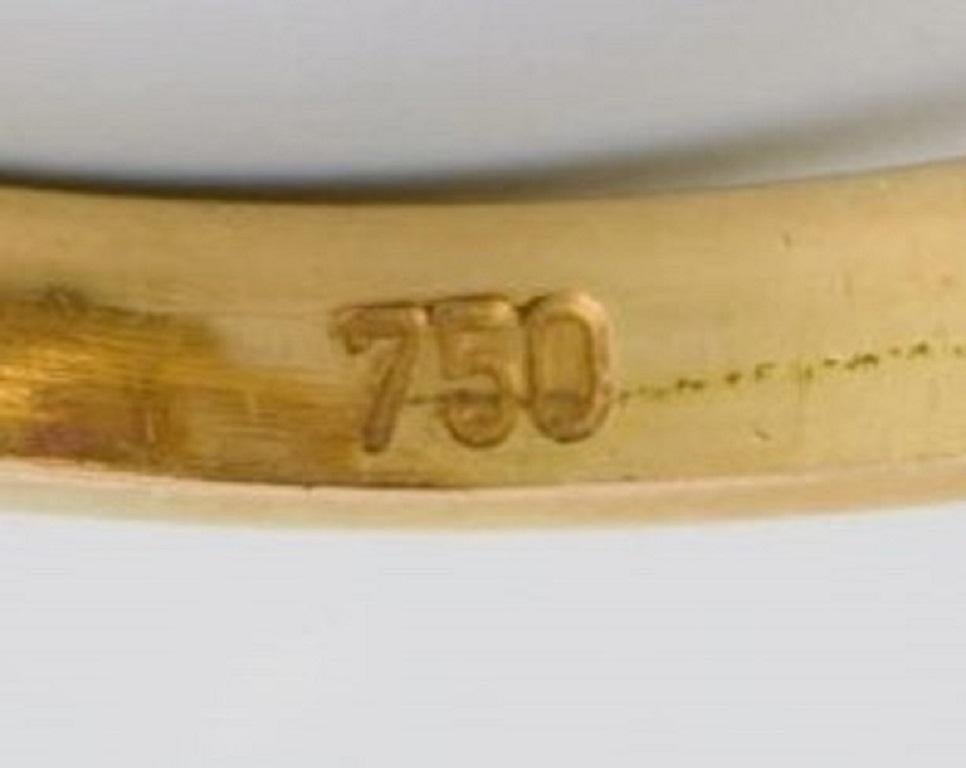 Skandinavischer Juwelier, Ring aus 18 Karat Gold mit Diamanten und lila Steinen Damen im Angebot