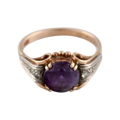 Scandinavian Jeweler, Vintage Ring in 14 Carat Gold Adorned with Purple Stone