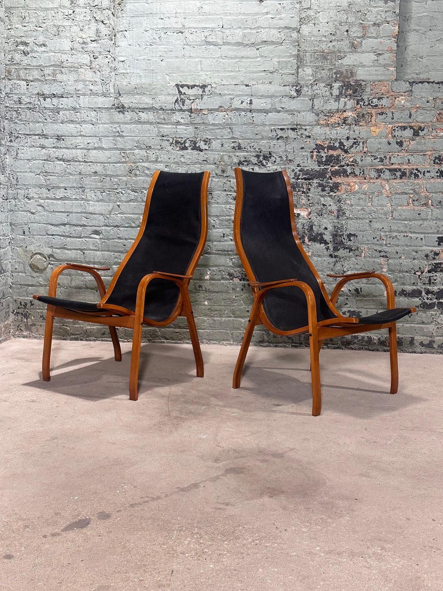 Scandinavian Lamino Leather Lounge Chairs by Yngve Ekstrom for Swedese, 1950's. Restored and also have new black leather.
The Lamino Chair by Yngve Ekstrom for Swedese is a classic piece of Scandinavian Design. Chairs have curved wooden frames with