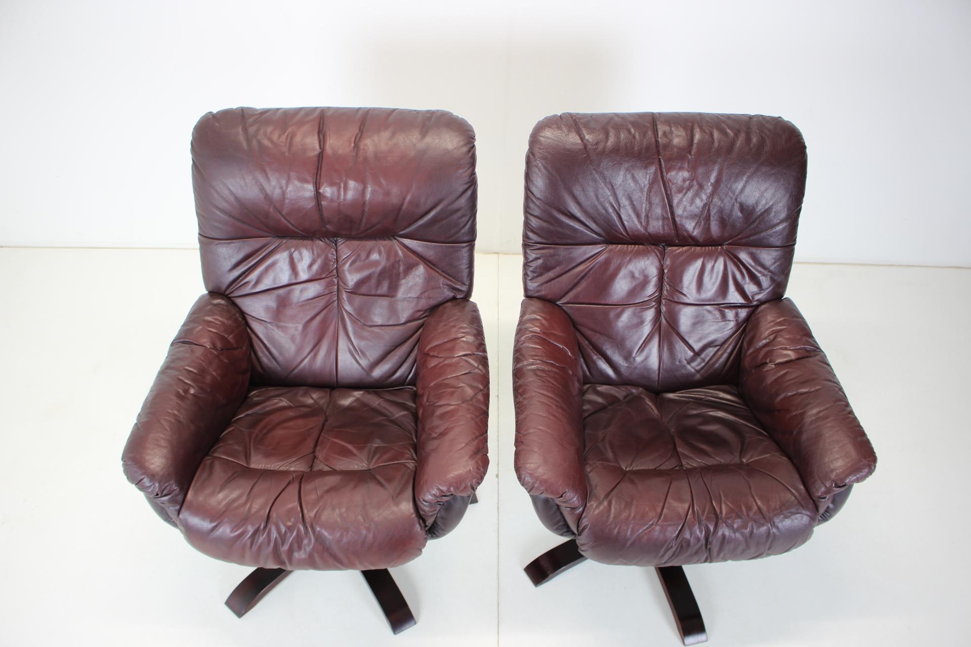 Space Age Scandinavian Leather Armchairs / Lounge Chairs, with Footres 1970s, Finland For Sale