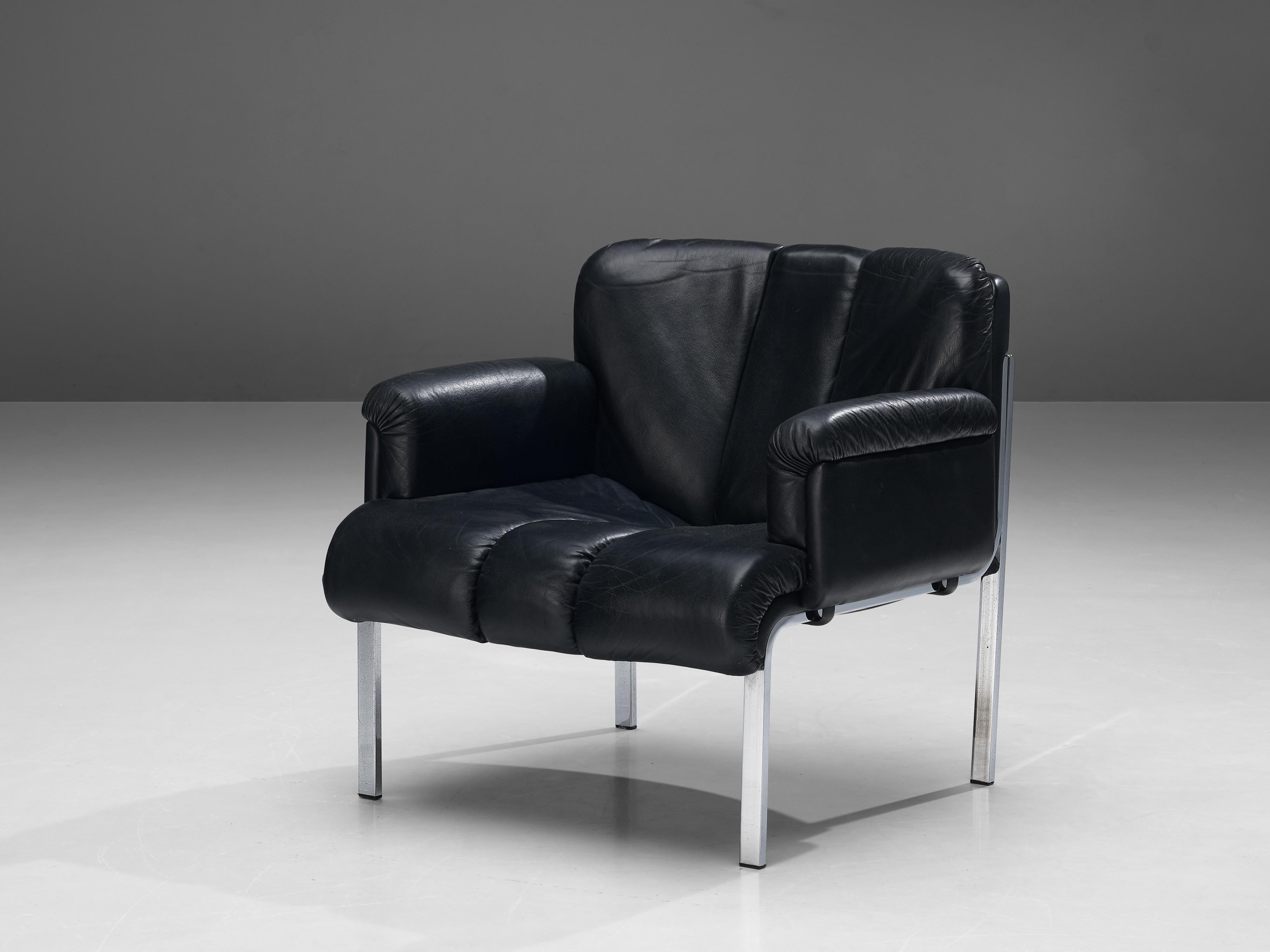 Hans Eichenberger for Girsberger, lounge chair model ‘Eurochair’, leather, chromed steel, Switzerland, 1970s 

This lounge chair is created by the Swiss designer Hans Eichenberger whose designs can be admired in several permanent design collections,