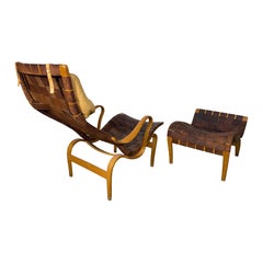 Scandinavian Lounge Chair & ottoman "Pernilla 1" by Bruno Mathsson, LEATHER