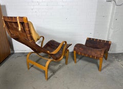 Scandinavian Lounge Chair & ottoman "Pernilla 1" by Bruno Mathsson, LEATHER