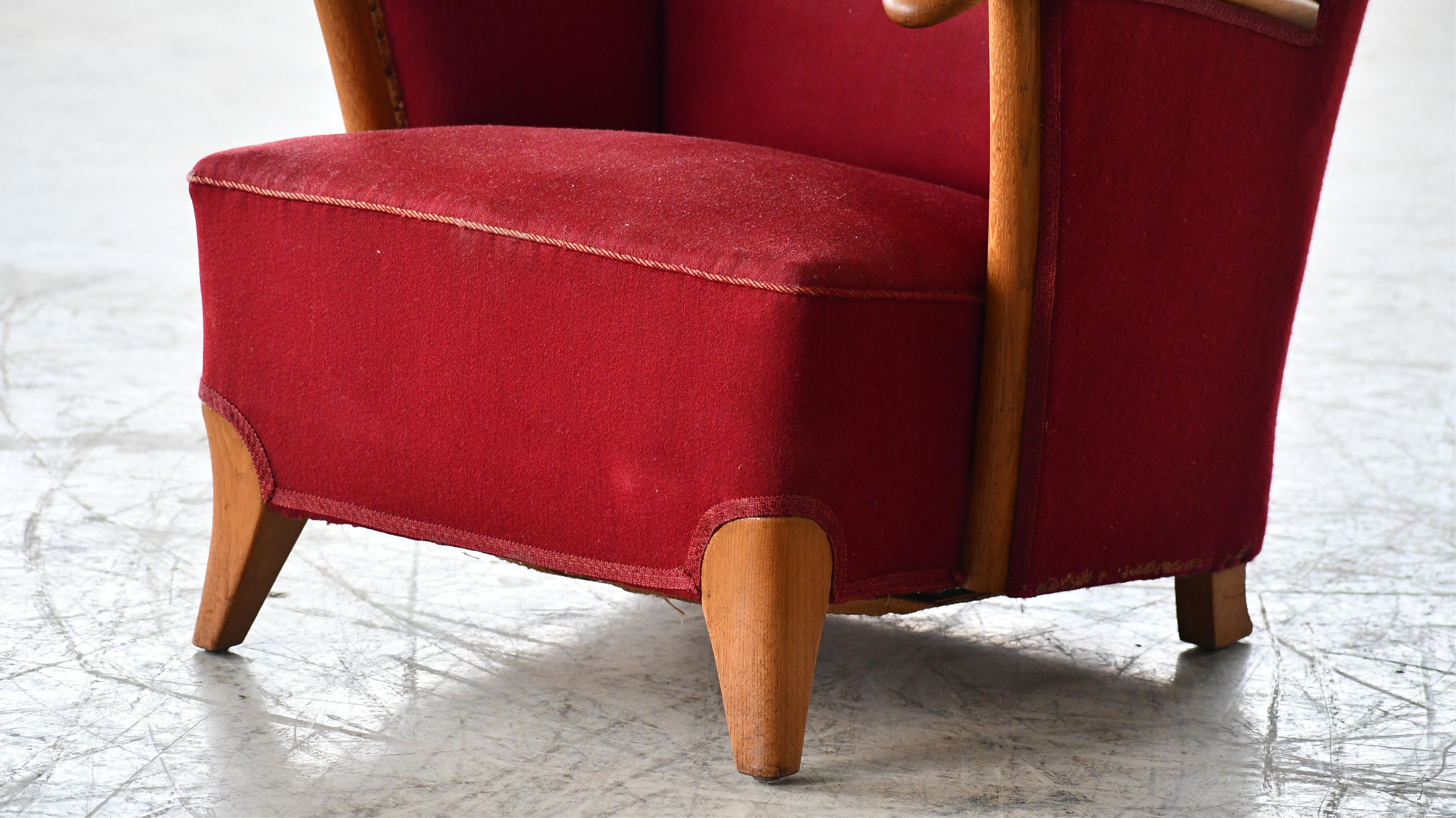 Mid-20th Century Scandinavian Lounge Chair with Oak Armrest Conical Legs Red Wool, 1940's  For Sale