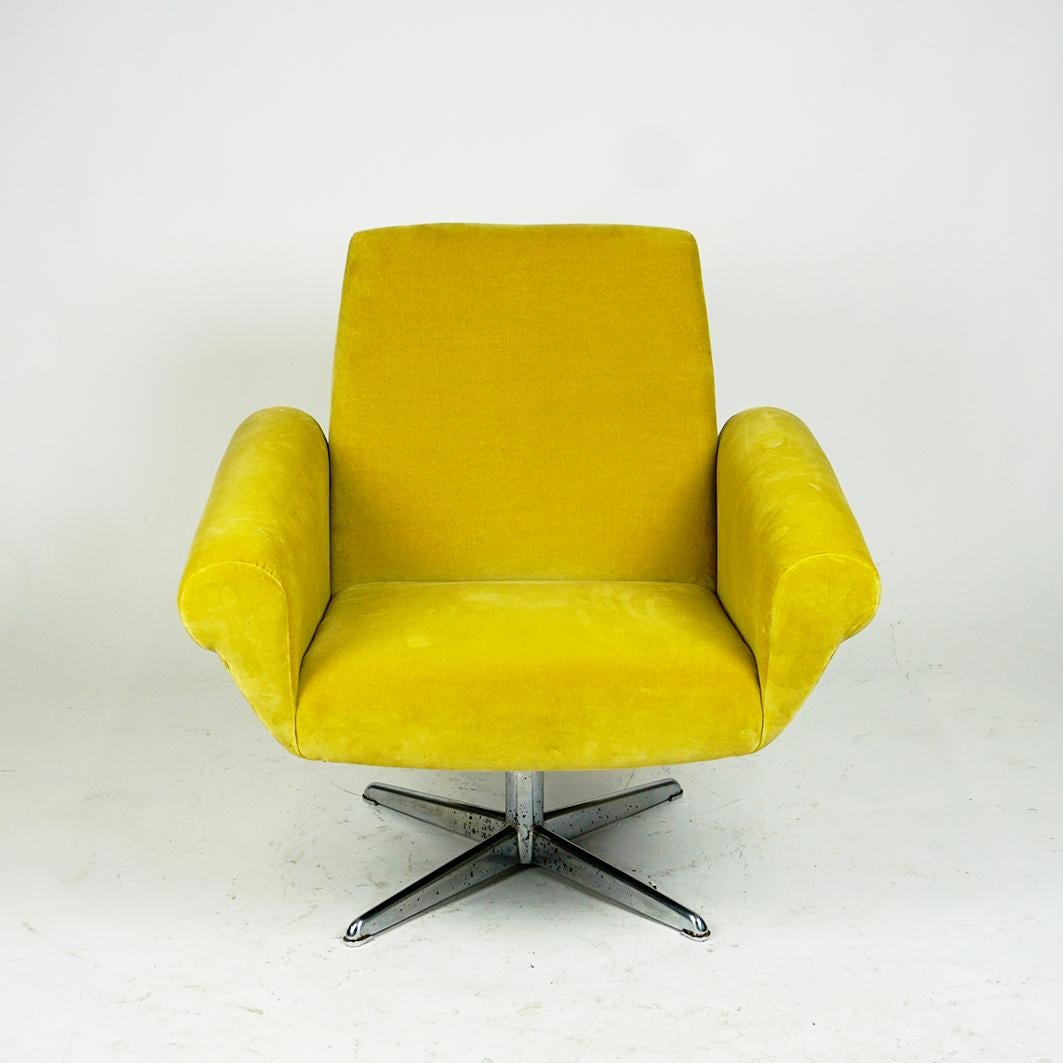 This highly comfortable classic modern vintage 1960's swivel lounge chair features a chrome star base and a renewed yellow  Velvet upholstery with Kvadrat fabric by Raf Simons.  It is in beautiful conditdion and ready fot use,