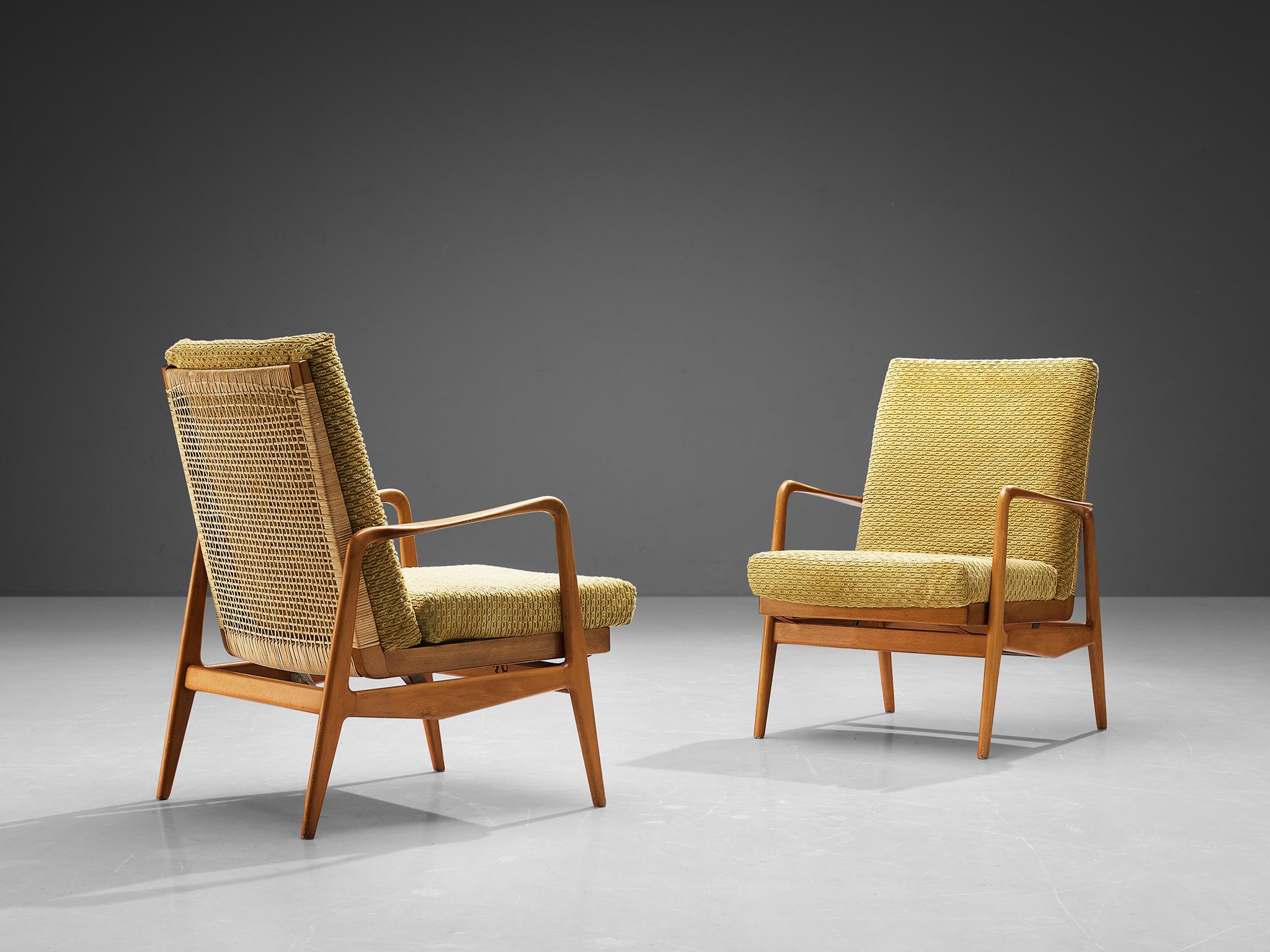 Lounge chairs, beech, cane, fabric, Scandinavia, 1960s. 

This Scandinavian set of lounge chairs resembles the designs of Hartmut Lohmeyer. Its exterior is organically shaped. The wide open wooden frame features a slightly tilted back made out of