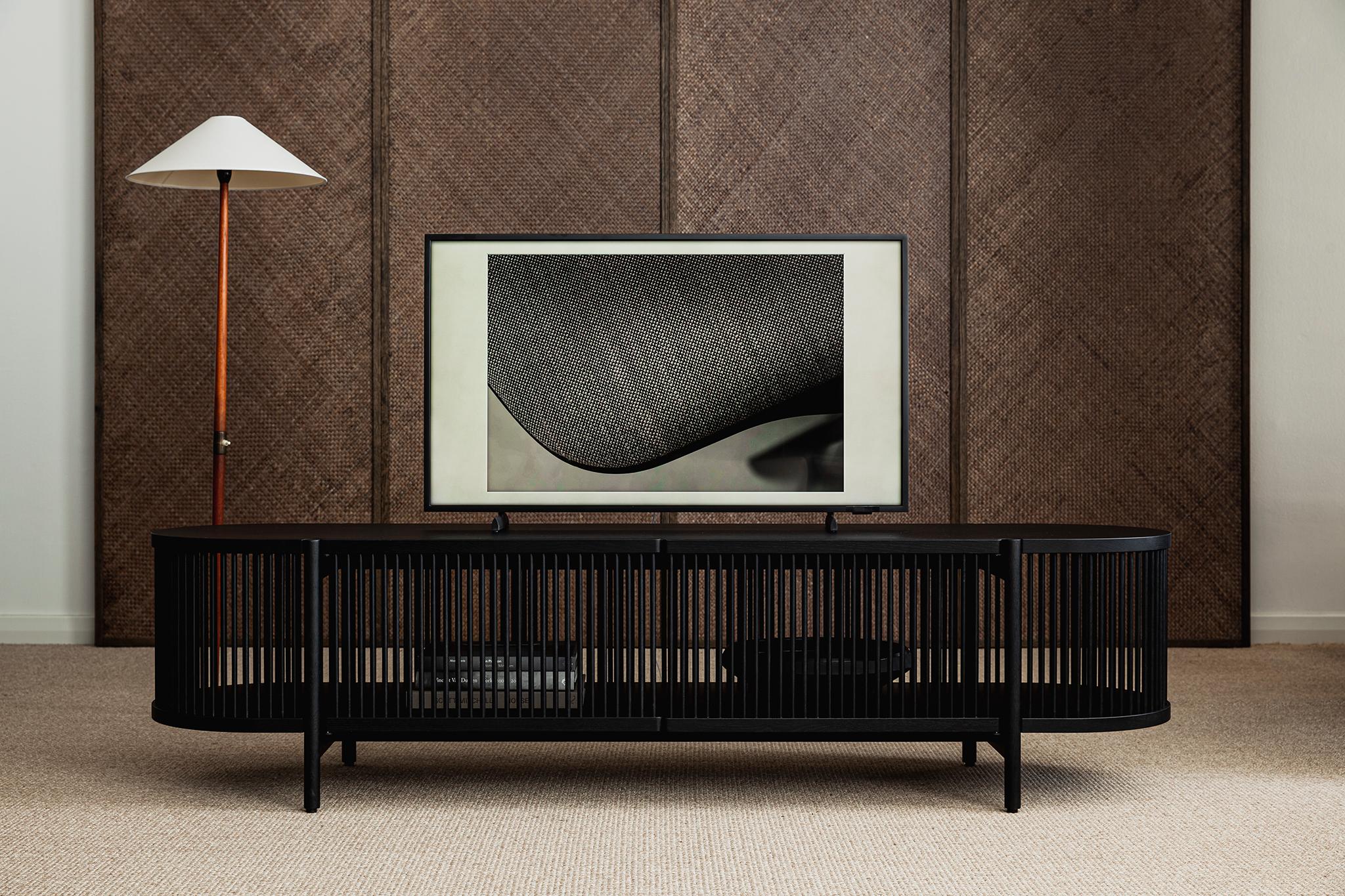 Low sideboard Bastone // black oak 
Designed by Antrei Hartikainen, 2022

Dimensions : H. 50 cm / W. 200 cm / D. 53 cm

Model shown in the picture : 
- Color : Black oak 
- Without doors

Designed by the award-winning master cabinet maker