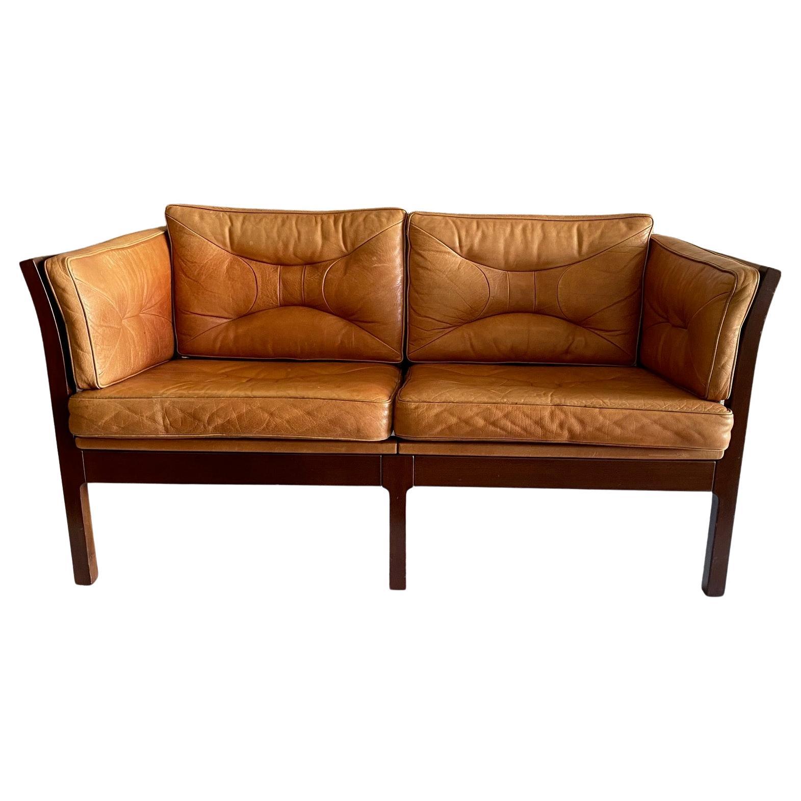 Scandinavian Mahogany and Leather Settee For Sale