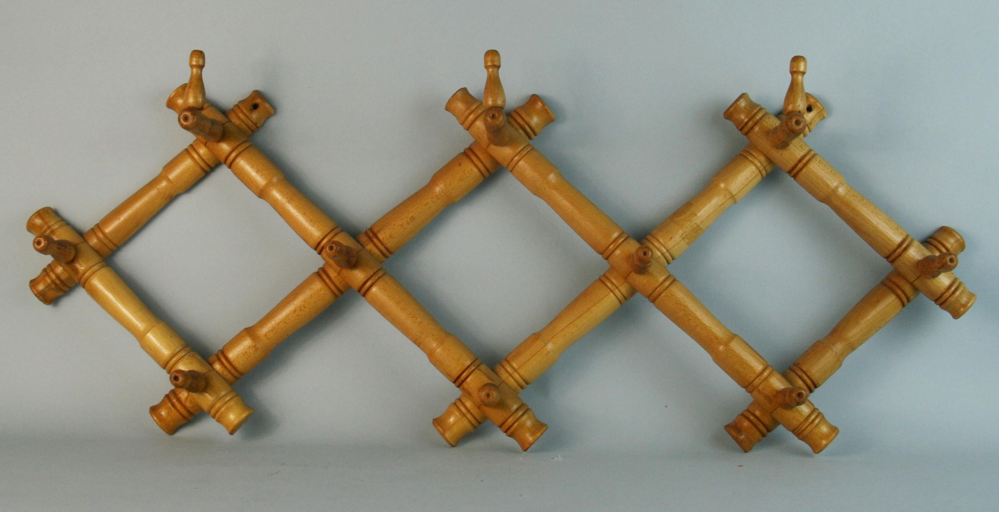 1384 Scandinavian solid maple expandable hat / coat rack.
 