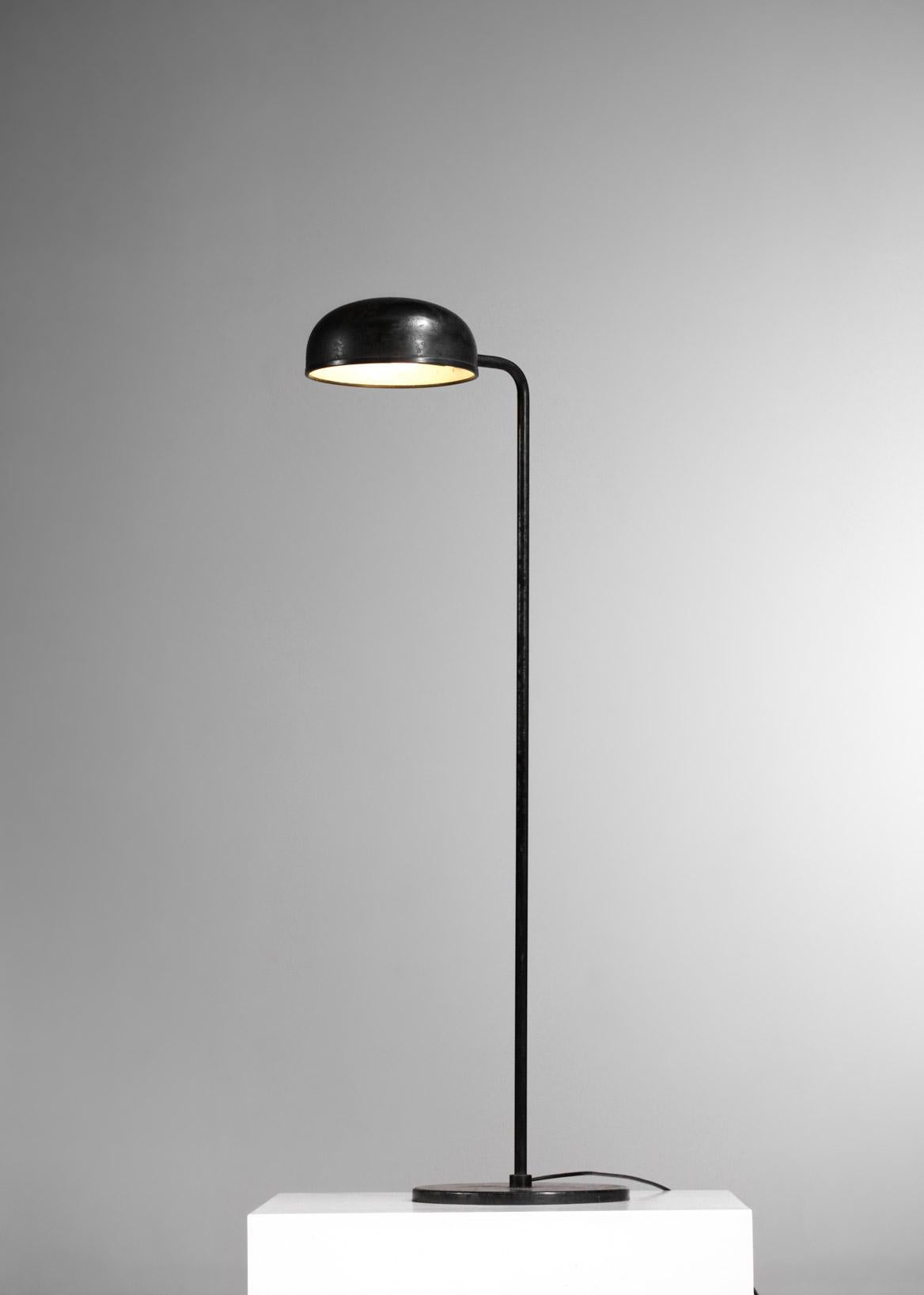 Scandinavian floor lamp from the 70's, model P98 by Danish designer Abo Randers.  Entirely in black lacquered metal, inside the lampshade lacquered in white (original paint). Clean and timeless lines typical of Scandinavian design. The lamp has been