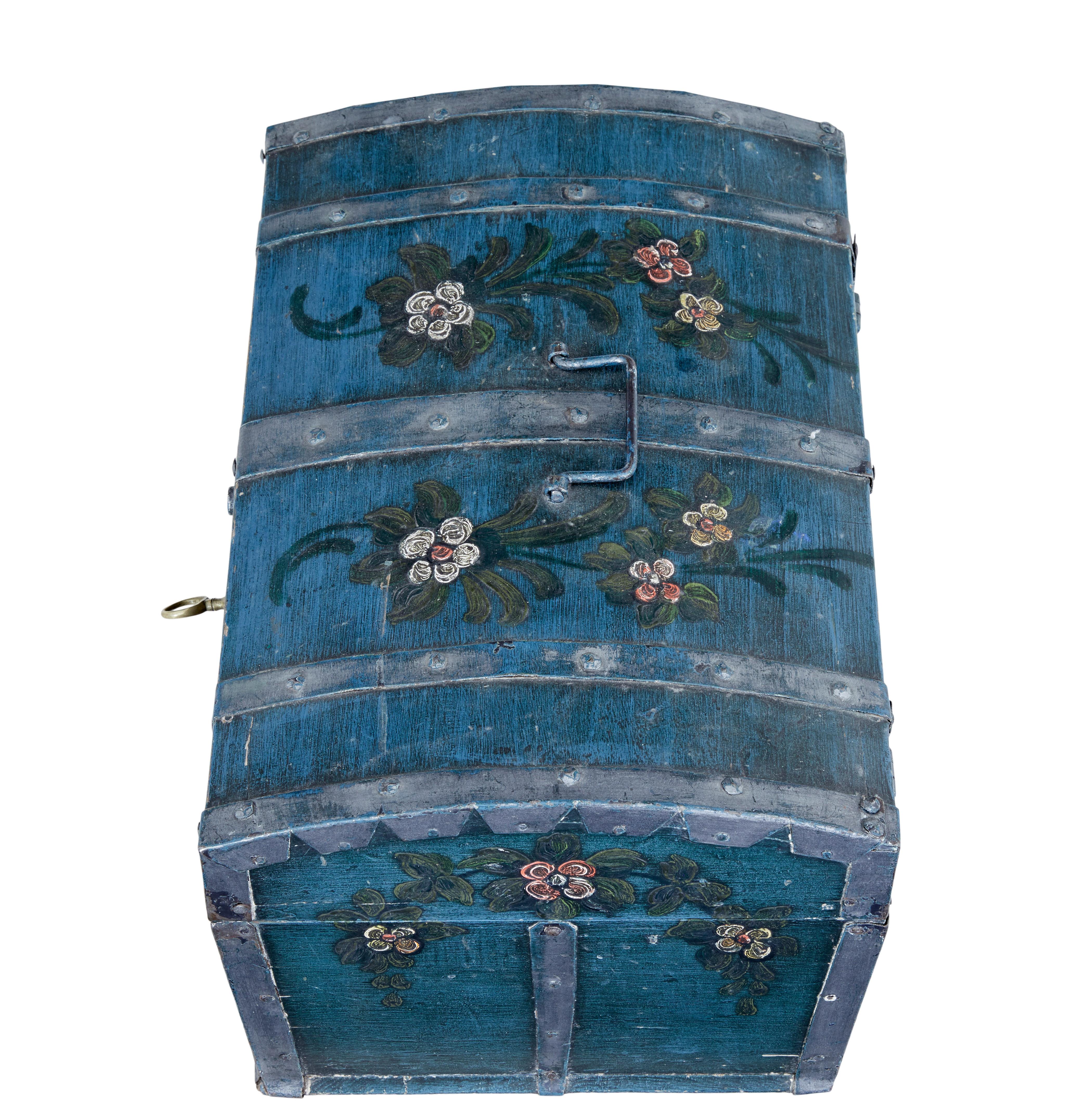 Scandinavian mid-19th century hand painted dome top pine box circa 1850.

Fine example of mid-19th century swedish traditional decoration. Blue/green main colour with hand painted flowers on all viewable surfaces. Complete with original strapwork