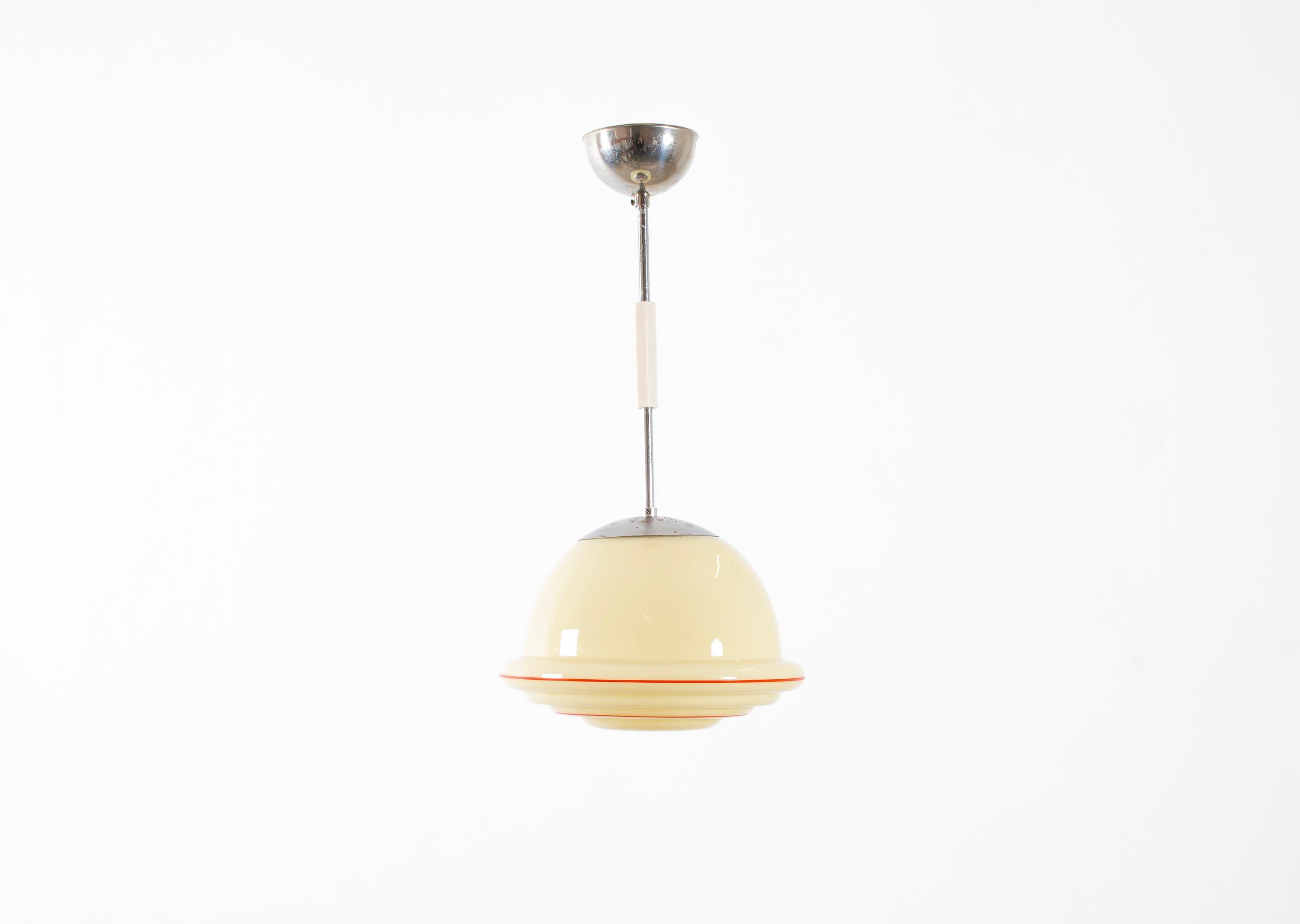 Modernist ceiling light in chrome with decorated shade in blown glass. Designed and made in Norway from cirka 1950s second half. The lamp is fully working and in good vintage condition. It is fitted with one E27 bulb holder (works in the US), with a