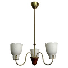 Scandinavian mid century chandelier, brass, walnut and glass, Sweden, 1940s