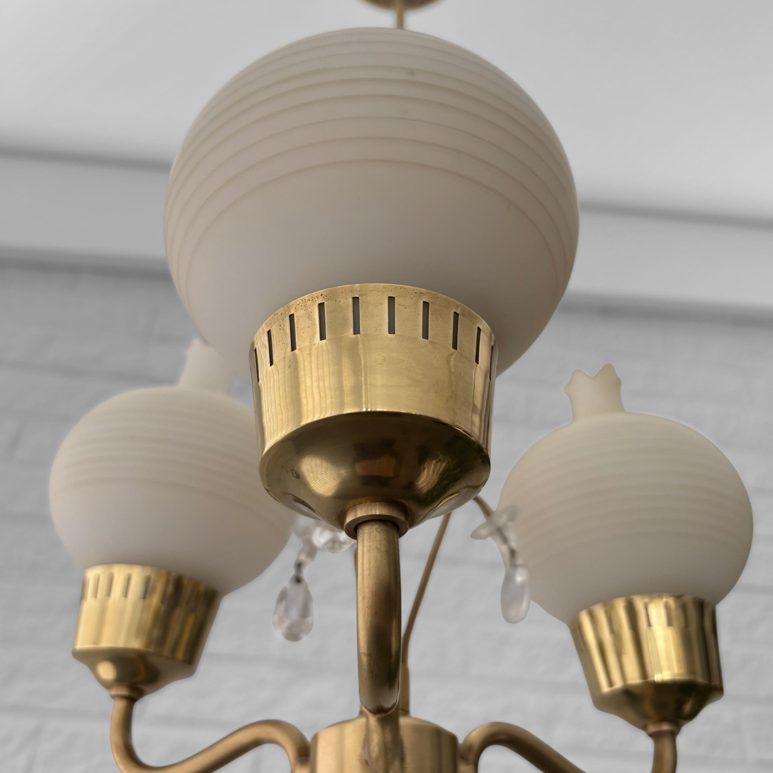 Scandinavian mid-century chandelier, brass with crystal prisms, Sweden, 1940s 1