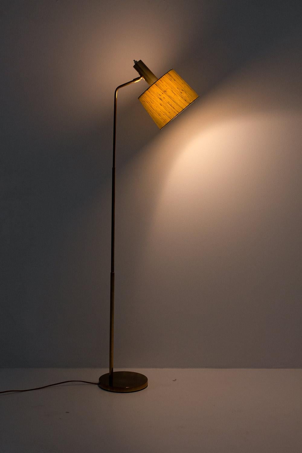 Scandinavian floor lamps model G-03 by Alf Svensson and Yngvar Sandström for Bergboms, Sweden, 1960s.
The lamps are made of solid brass with original fabric shades.

Condition: Very original condition except for some minimal dents and scratches