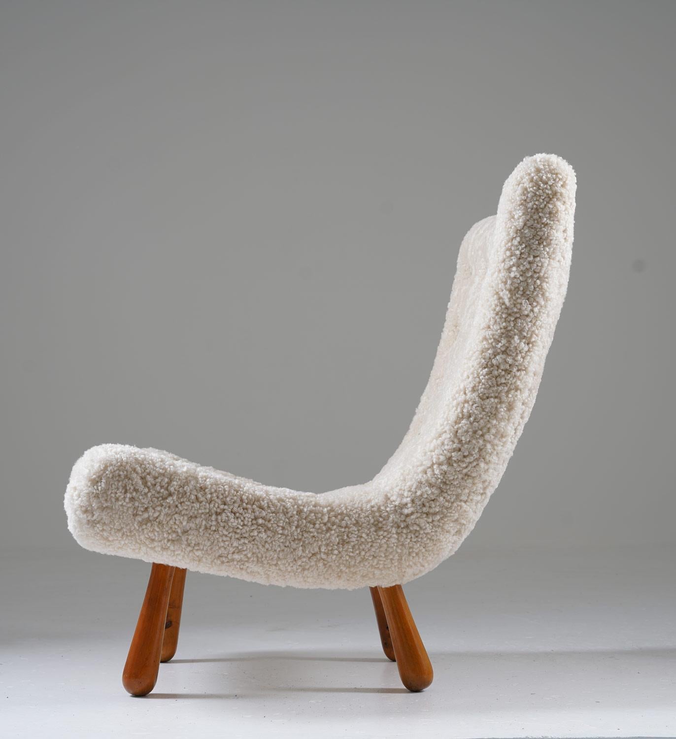 Scandinavian Modern Scandinavian Mid Century Lounge Chair in Sheepskin For Sale