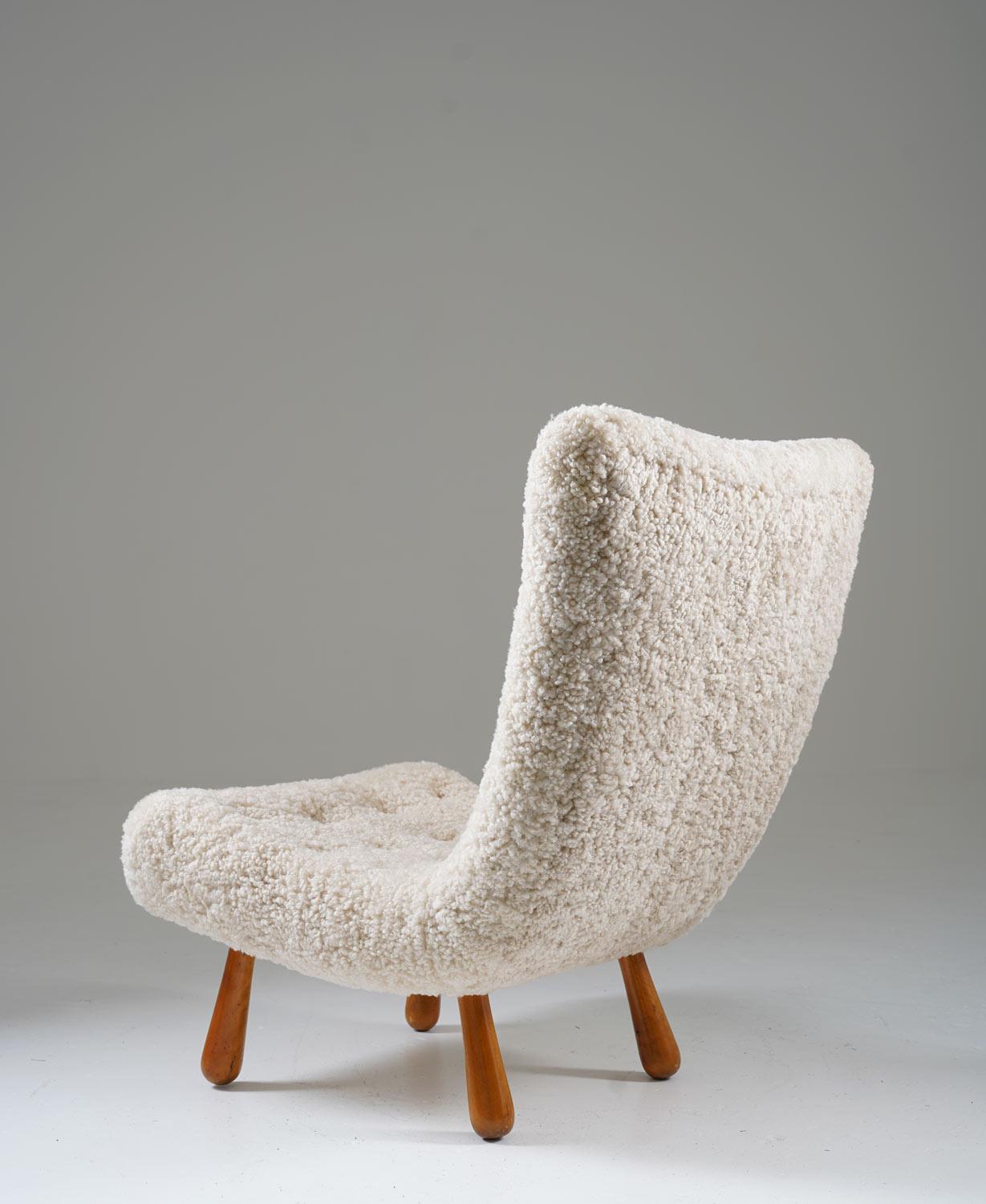 Swedish Scandinavian Mid Century Lounge Chair in Sheepskin For Sale